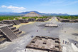 Popular tourist destination ancient Aztec city ruins of the pyramids of Teotihuacan close to Mexico City with the Pyramid of the Sun and the Pyramid of the Moon and prehistoric stone walls