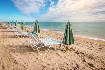 Wall Mural - Chairs and umbrella on the beach of Hollywood, Florida.