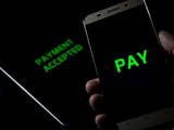 Fototapeta Przestrzenne - Contactless payment between smartphone and tablet pay cashless - payment accepted