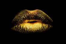 Gold Paint From The Lips. Golden Lips On Beautiful Model Girls Mouth. Make-up. Beauty Makeup Close Up. Golden Make Up In Lips. Gold Concept.