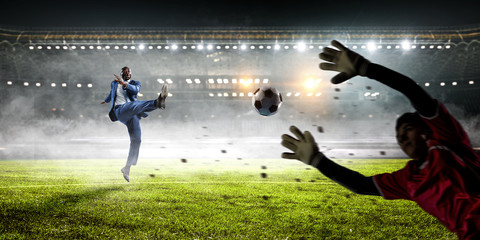 Wall Mural - Soccer businessman in action with ball. Mixed media