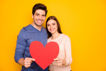 Sticker - Portrait of two people married couple hug embrace hold paper card red big heart passionate love symbol celebrate 14-february holiday wear blue pink sweater isolated yellow color background