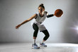 © master1305 - Young caucasian female basketball player of team in action, motion in run isolated on white wall background. Concept of sport, movement, energy and dynamic, healthy lifestyle. Training, practicing.