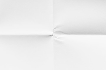 Blank paper folded in four, close-up