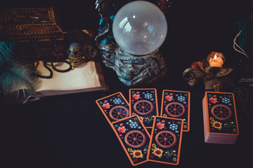 Magic scene, Mystical atmosphere, view of tarot card on the table, esoteric concept, fortune telling and predictions