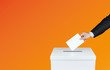© Sapiens - Hand of a person use a vote into the ballot box in elections. With orange background