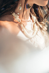 Wall Mural - cropped view of nude boho girl with necklace