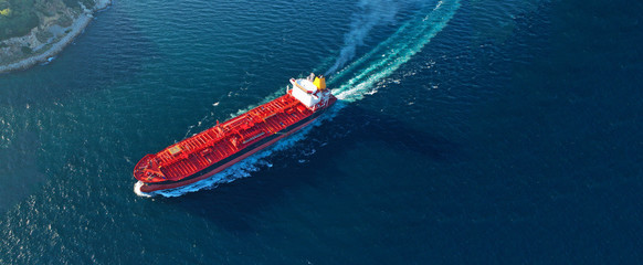 Wall Mural - Aerial drone ultra wide panoramic photo of industrial crude oil tanker cruising open ocean deep blue sea