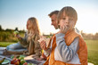 © Svitlana - Time to eat. Happy family spending time in the park on a sunny day