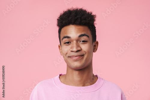 Photographie Portrait of a smiling african teenager boy wearing pullower