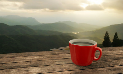 Black coffee in red cup on wooden table  mountain view in the morning. 3D Rendering