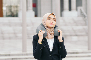 young executive businesswoman in black suit standing with confident face expression