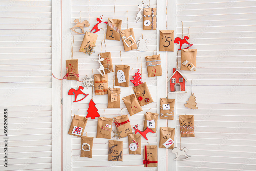 Christmas advent calendar with envelopes on folding screen