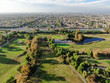 Aerial view over golf field. Large and green turf golf course in South California. USA