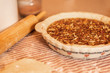 Baking a fresh homemade pecan pie for the Holidays