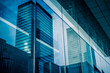 Leinwandbild Motiv Reflection of architecture on modern office building