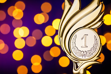 Wall Mural - gold award trophy for the winner of a competition