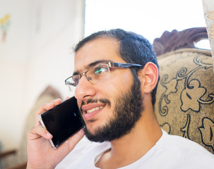 Arab boy with smart phone