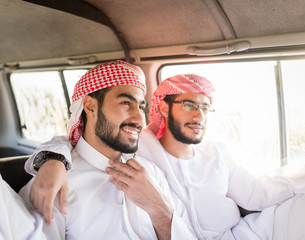 Arabic young men in travel car