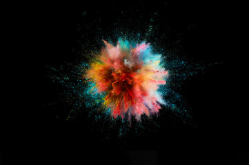 Wall Mural - Colored powder explosion. Abstract closeup dust on backdrop. Colorful explode. Paint holi