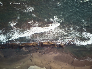 Wall Mural - Ocean coastline with people