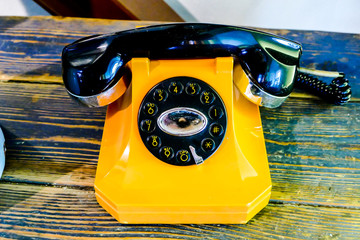 Wall Mural - old telephone on vintage background, in Lisbon Capital City of Portugal