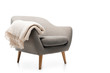 © LIGHTFIELD STUDIOS - comfortable grey modern armchair with blanket isolated on white
