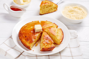 Sticker - Cornbread on a white plate, top view