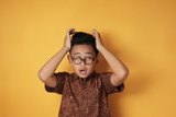 Fototapeta Nowy Jork - Asian Boy Shows Tired and Bored Gesture