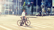 © Syda Productions - people, style and lifestyle concept - young man with bicycle crossing crosswalk on city street