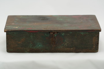 Old wooden box with a metal lock