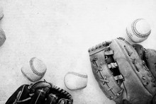 Baseball Equipment Flat Lay On Background With Copy Space By Balls And Mitt In Black And White.