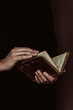 © Vera Lair/Stocksy - anonymous woman reading a old book