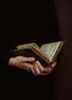 © Vera Lair/Stocksy - anonymous woman reading a old book