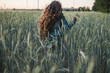© Ira Efremova Photography/Stocksy - Long haired girl running through the field