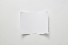 Empty Sheet Of Paper Presented On A Gray Paper Background With Copy Space For Text. Layout For Your Ideas. Top View