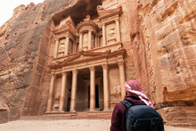 Unrecognizable Tourist Contemplating Treasure Temple Of Petra