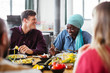 © Bonninstudio/Stocksy - Friends having fun at a dinner party.