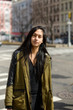 © Lauren Naefe/Stocksy - Young woman in city street