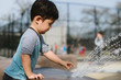 © Lauren Naefe/Stocksy - Little kid playing at playground