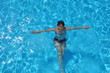 © AliaksaB - Aerial top view of woman in swimming pool water from above