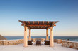 © Trinette Reed/Stocksy - Outdoor fire pit on the ocean at a luxury resort in Mexico