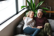 © Rob and Julia Campbell/Stocksy - Couple enjoying time together in loft condo home.