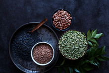 A variety of pulses and curry leaves