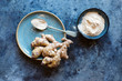 © Nadine Greeff/Stocksy - Fresh ginger root and baobab powder