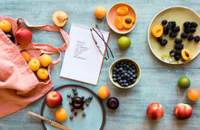 Shopping Bag, Shopping List And Fresh Fruits On Blue Tabletop