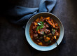 © Nadine Greeff/Stocksy - Bowl of hearty beef stew with vegetables