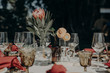© Isaiah & Taylor Photography/Stocksy - A wedding day dinner setup