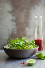 Herb And Lettuce Salad With Pomegranate Vinaigrette
