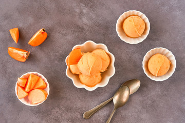 Poster - Persimmon ice cream sorbet. Top view with copy space